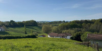terrain à URT (64240)